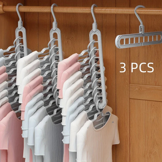 Magic 9-Hole Foldable Clothes Hanger – Space Saver Metal Organizer with 360° Rotating Hook 🌀