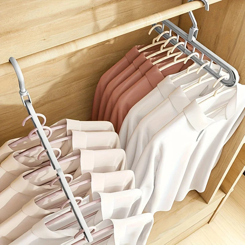 Magic 9-Hole Foldable Clothes Hanger – Space Saver Metal Organizer with 360° Rotating Hook 🌀
