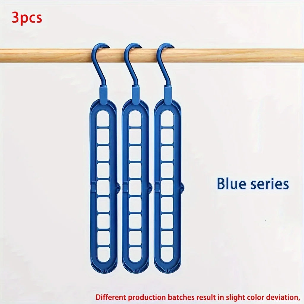 Magic 9-Hole Foldable Clothes Hanger – Space Saver Metal Organizer with 360° Rotating Hook 🌀