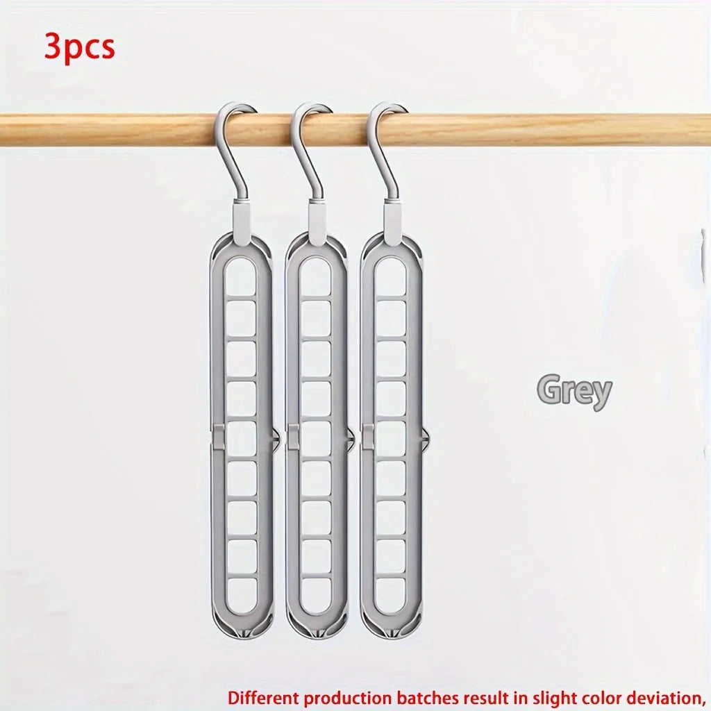 Magic 9-Hole Foldable Clothes Hanger – Space Saver Metal Organizer with 360° Rotating Hook 🌀