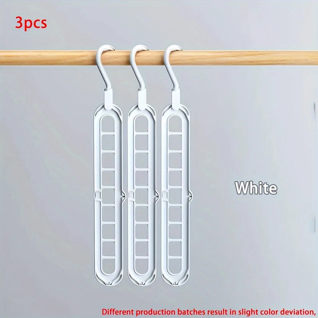 Magic 9-Hole Foldable Clothes Hanger – Space Saver Metal Organizer with 360° Rotating Hook 🌀