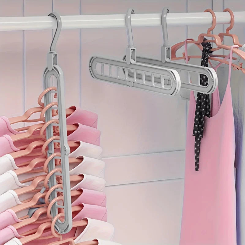 Magic 9-Hole Foldable Clothes Hanger – Space Saver Metal Organizer with 360° Rotating Hook 🌀
